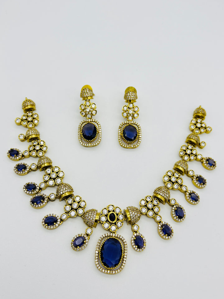 Regal Blue Stone Gold-Plated Necklace & Earring Set – Bridal & Festive Jewelry