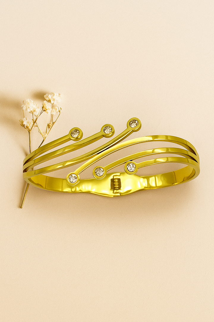 Gold Wave Elegance Bracelet with Sparkling Stones – Designer Artificial Jewelry for Women