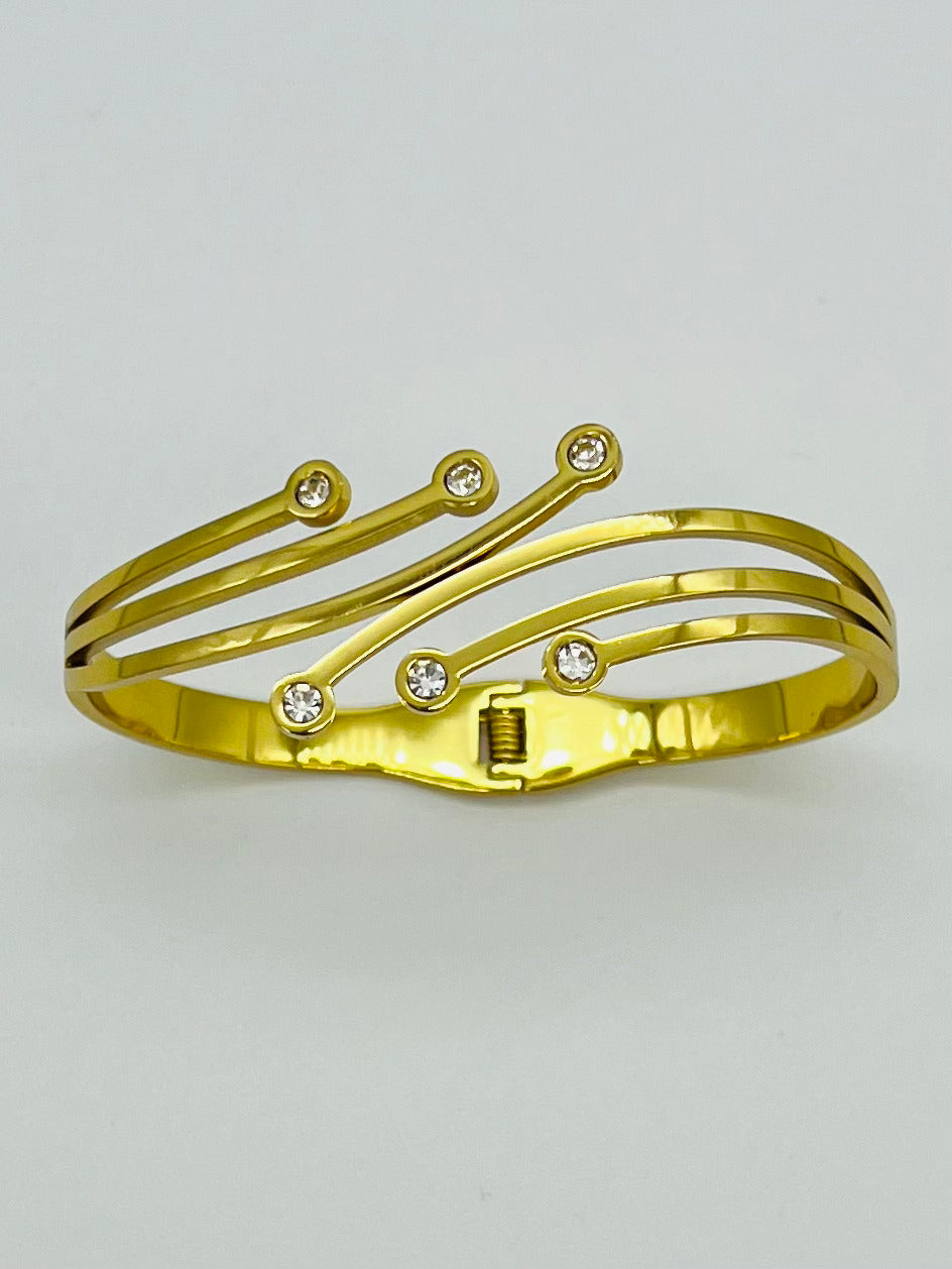 Gold Wave Elegance Bracelet with Sparkling Stones – Designer Artificial Jewelry for Women
