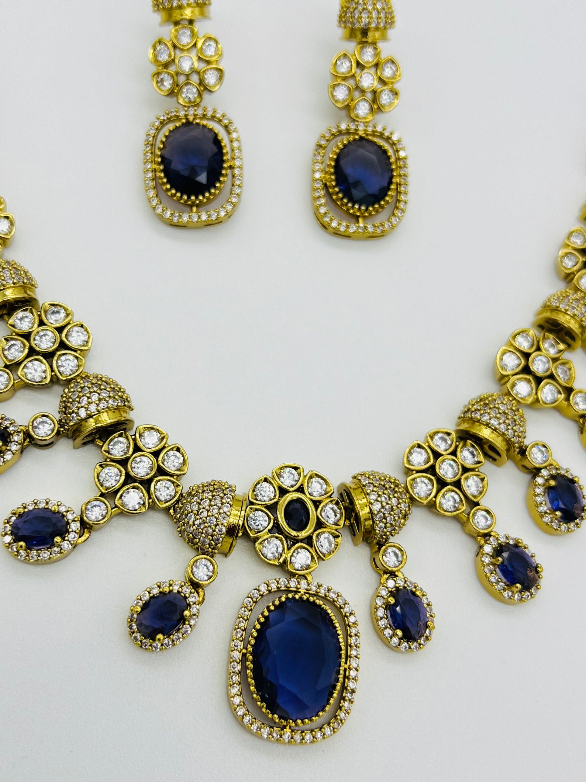 Regal Blue Stone Gold-Plated Necklace & Earring Set – Bridal & Festive Jewelry